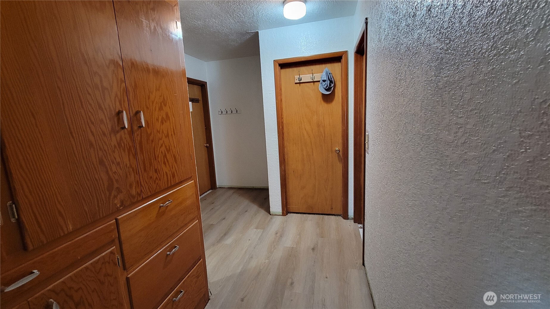 1296 Highway 12 Chehalis, WA 98532 - Photo 12 of 33 a view of a hallway with wooden floor