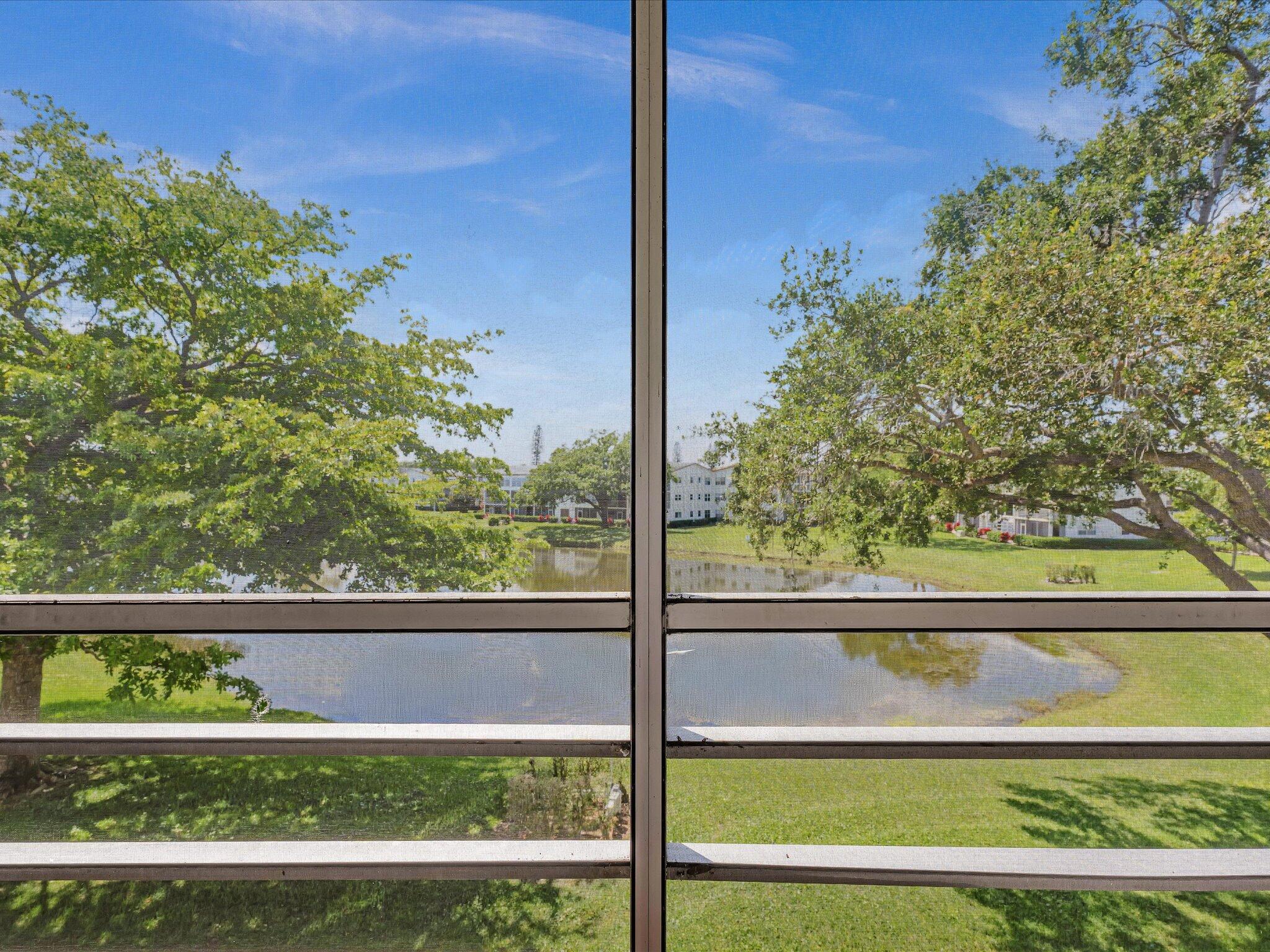 288 Fanshaw Drive, Unit G Boca Raton, FL 33434 - Photo 21 of 49 a view of outdoor space and yard