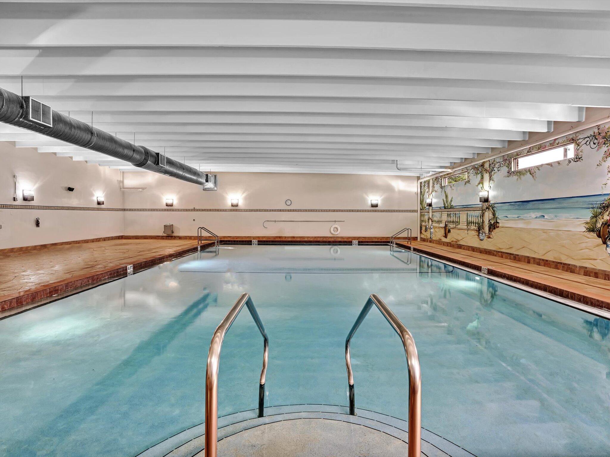 288 Fanshaw Drive, Unit G Boca Raton, FL 33434 - Photo 46 of 49 a view of a swimming pool