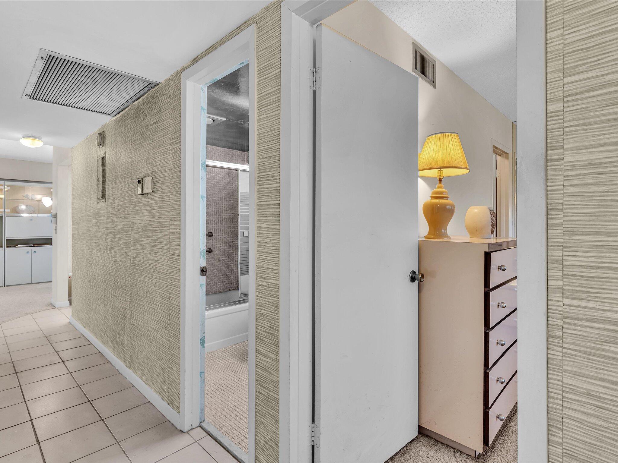 288 Fanshaw Drive, Unit G Boca Raton, FL 33434 - Photo 5 of 49 a bathroom with a shower