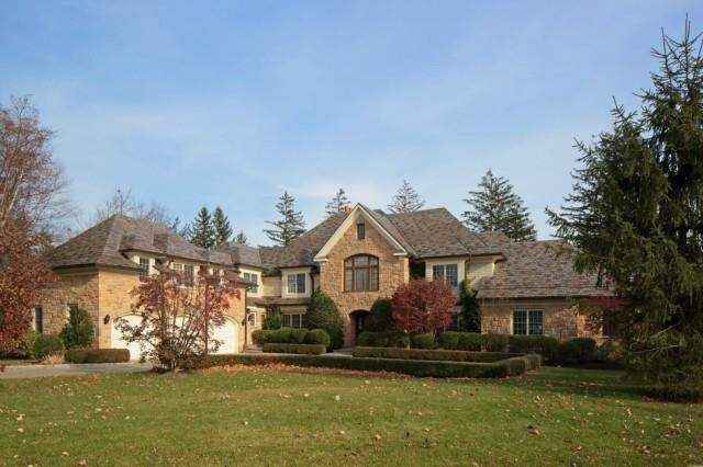21 Chieftans Road Greenwich, CT 06831 - Photo 1 of 1 front view of house with a yard