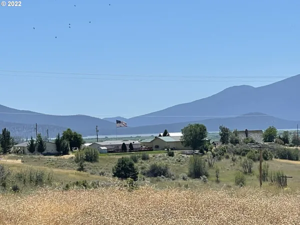 an aerial view of residential house and outdoor space
