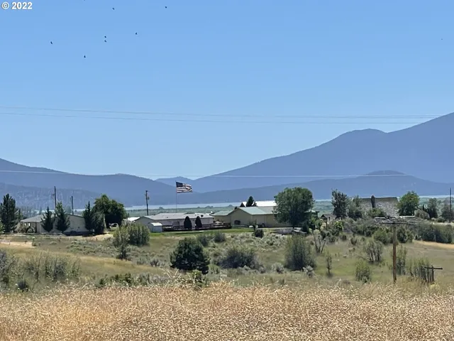 an aerial view of residential house and outdoor space