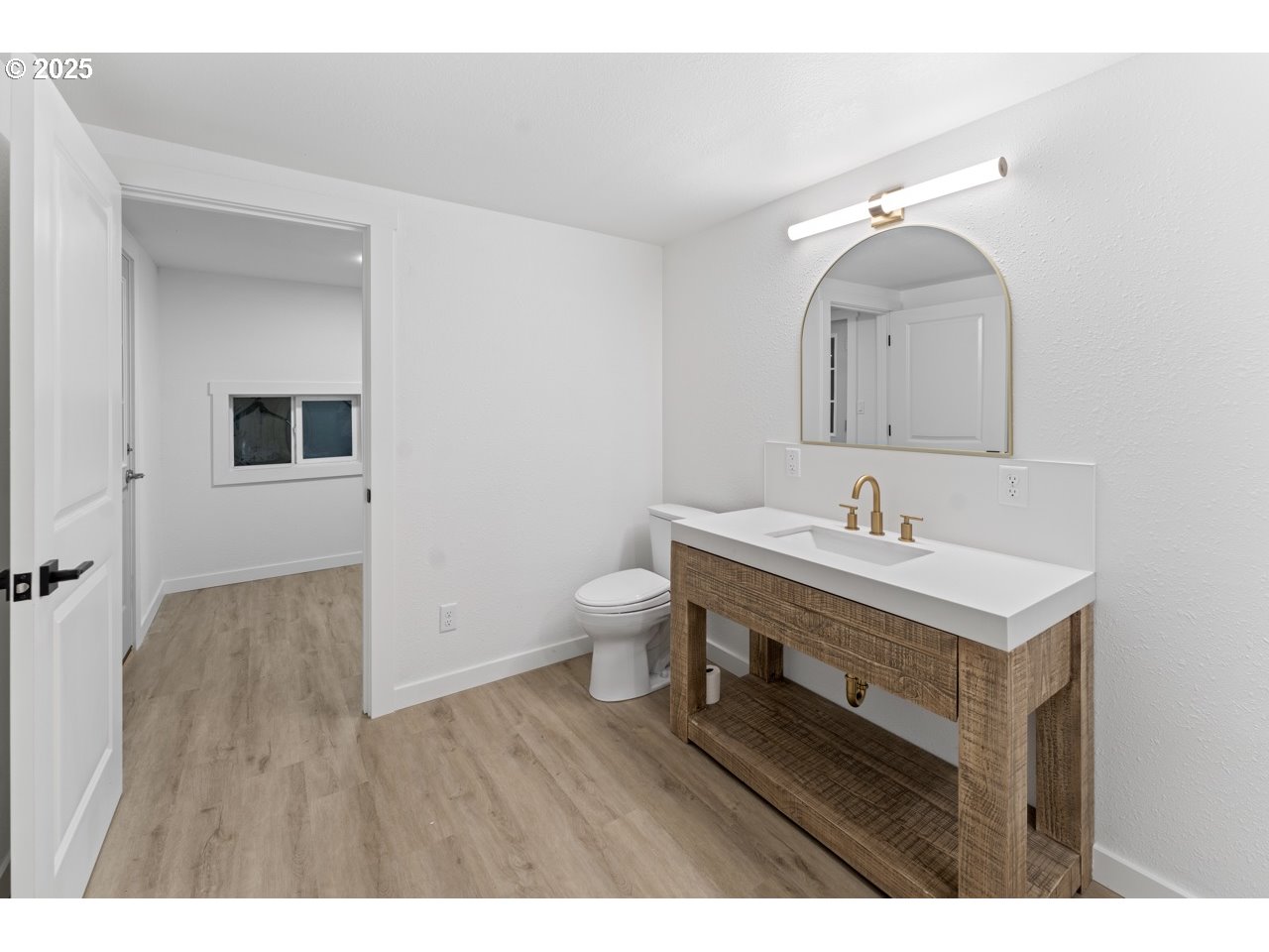 47875 Elgin Avenue Oakridge, OR 97463 - Photo 15 of 22 a bathroom with a sink mirror and toilet