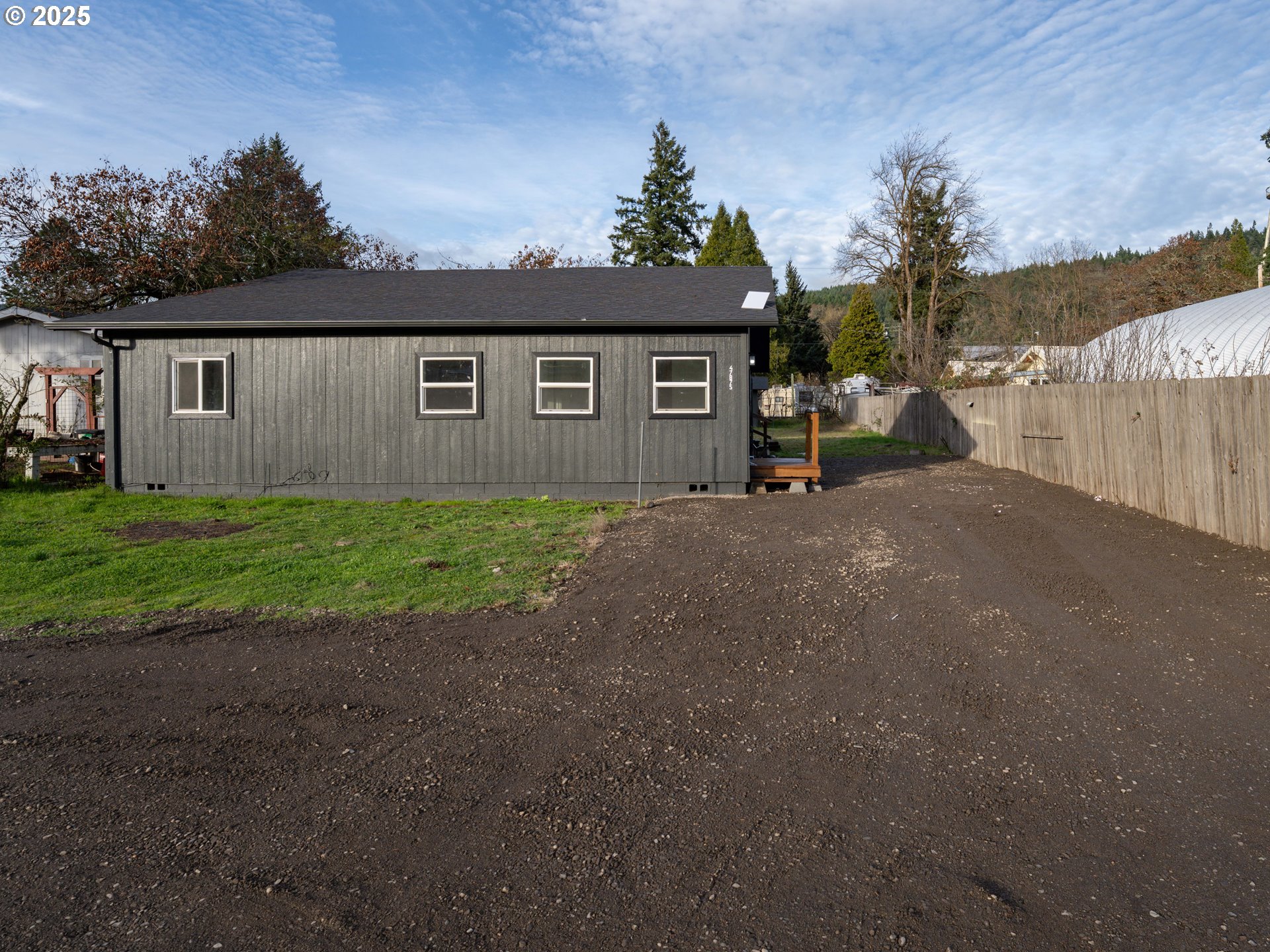 47875 Elgin Avenue Oakridge, OR 97463 - Photo 18 of 22 a view of a house with a yard