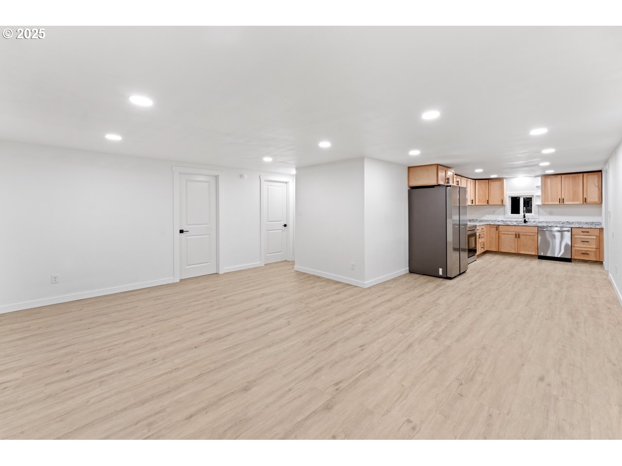 47875 Elgin Avenue Oakridge, OR 97463 - Photo 8 of 22 a view of a kitchen with a sink and a refrigerator