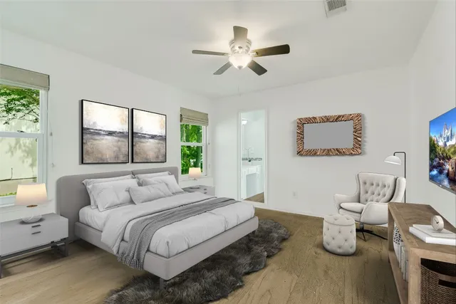 a bedroom with bed and window