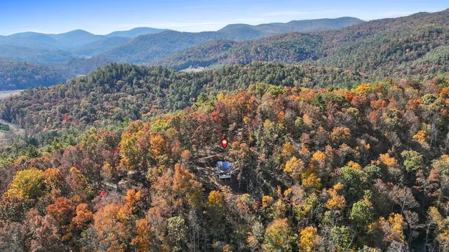 a view of two chairs in the balcony