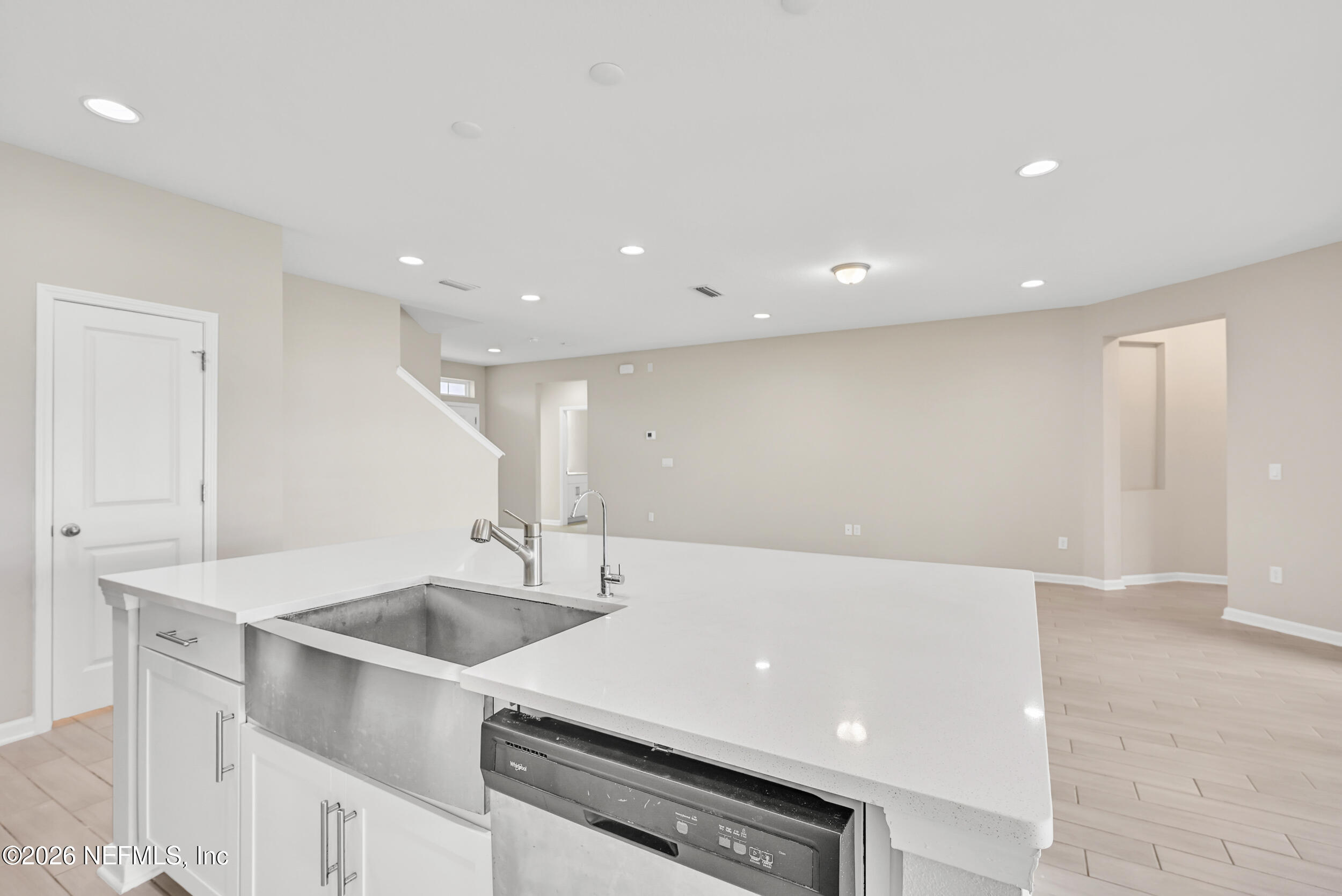 63 Goldcrest Way St. Augustine, FL 32092 - Photo 14 of 56 a kitchen with a sink and cabinets