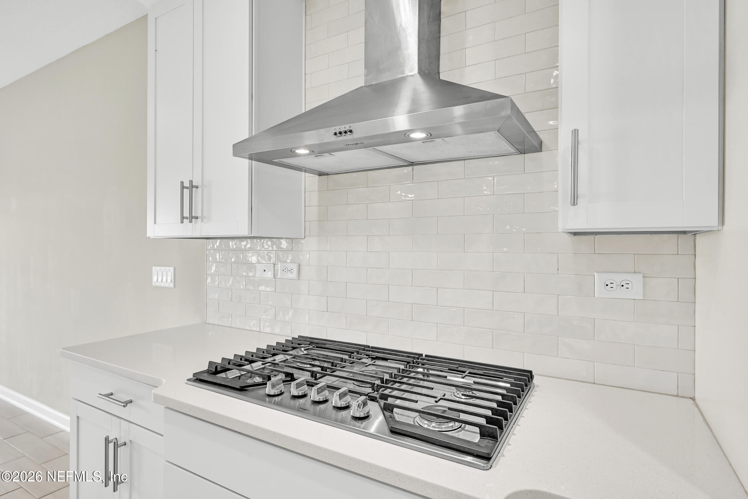 63 Goldcrest Way St. Augustine, FL 32092 - Photo 15 of 56 a white stove top oven sitting inside of a kitchen