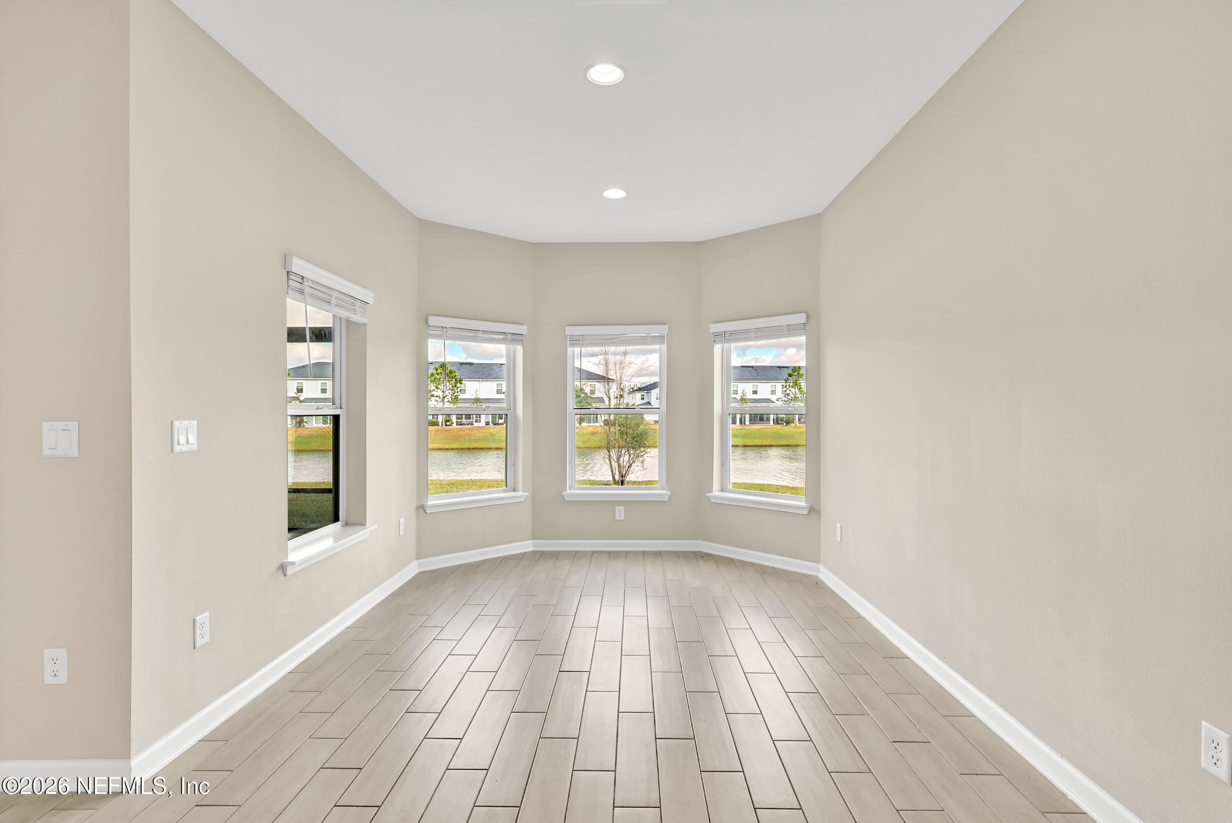 63 Goldcrest Way St. Augustine, FL 32092 - Photo 18 of 56 a view of an entryway of a house with a window and wooden floor