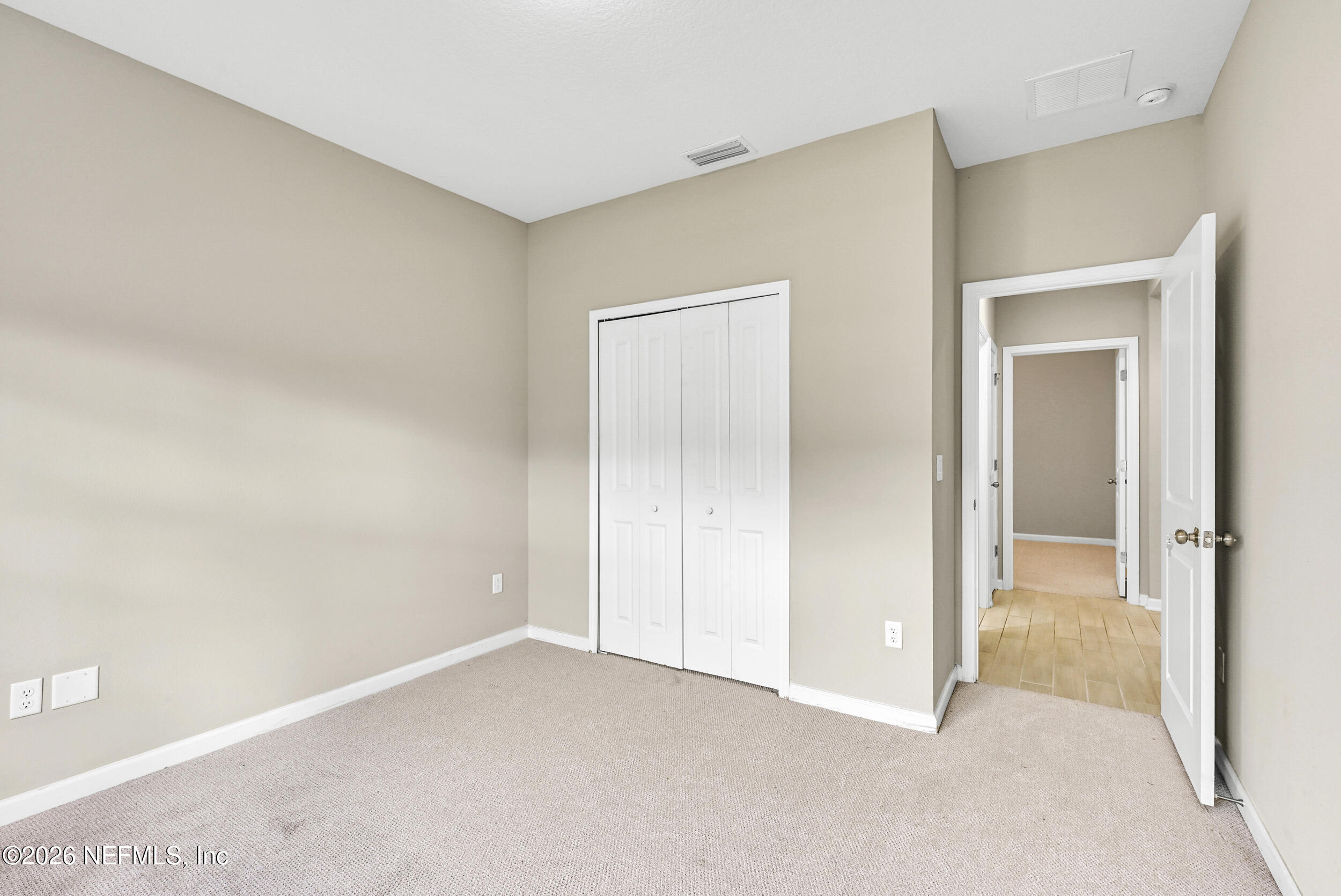 63 Goldcrest Way St. Augustine, FL 32092 - Photo 30 of 56 a view of an empty room and closet area