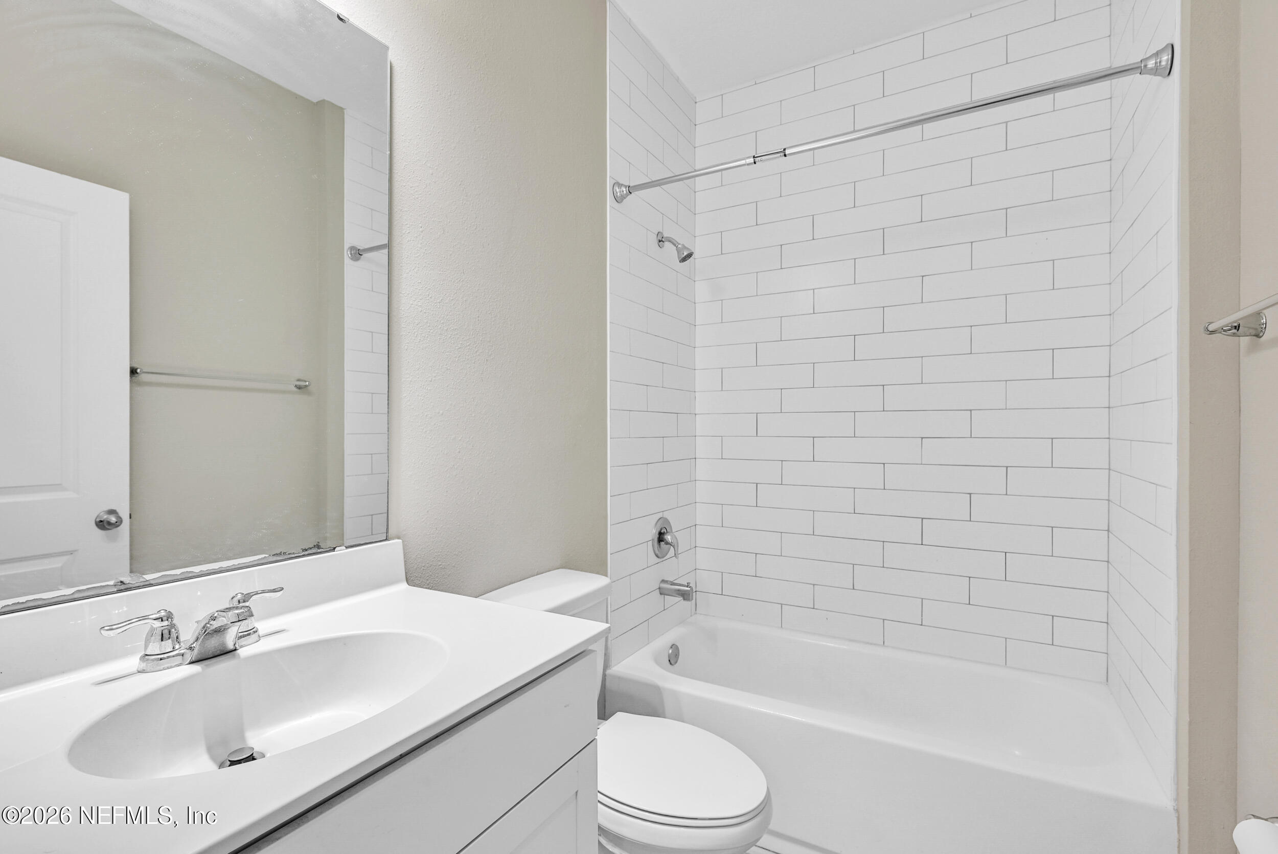 63 Goldcrest Way St. Augustine, FL 32092 - Photo 33 of 56 a bathroom with a bathtub shower sink vanity and toilet