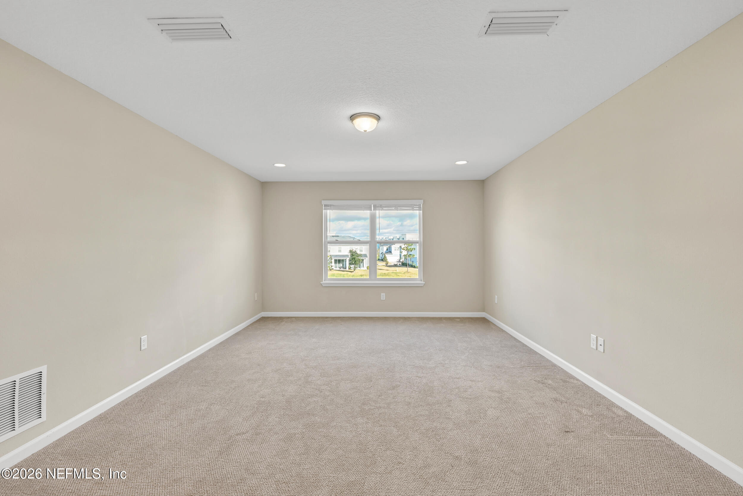 63 Goldcrest Way St. Augustine, FL 32092 - Photo 34 of 56 an empty room with a window