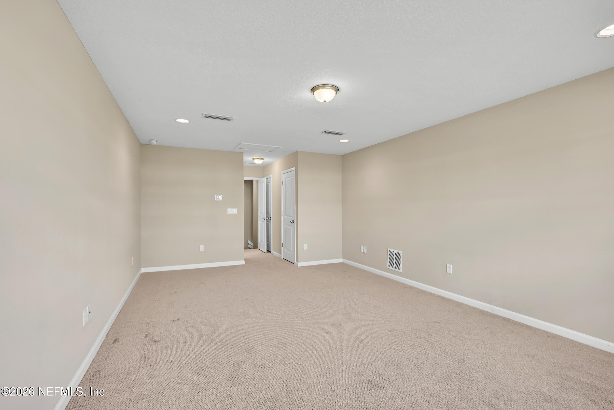 63 Goldcrest Way St. Augustine, FL 32092 - Photo 35 of 56 an empty room with an entryway