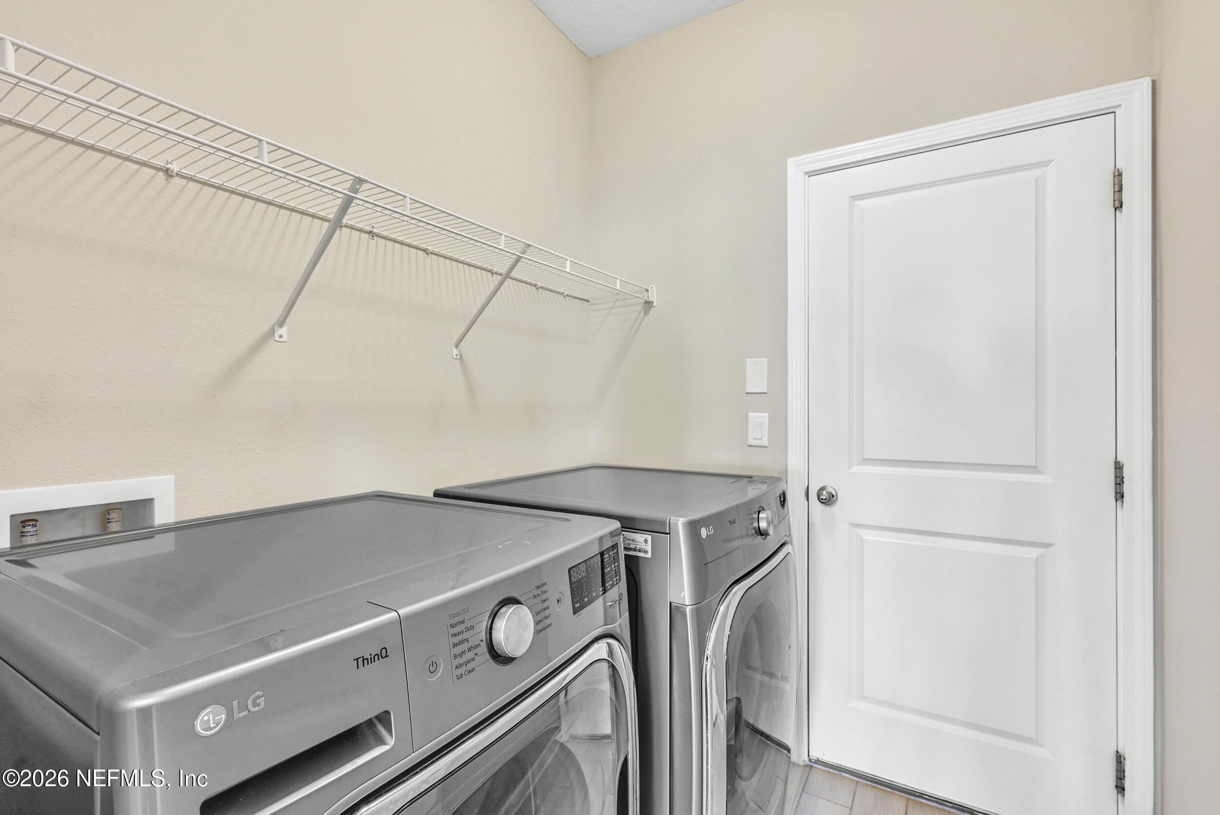 63 Goldcrest Way St. Augustine, FL 32092 - Photo 39 of 56 a utility room with dryer and washer