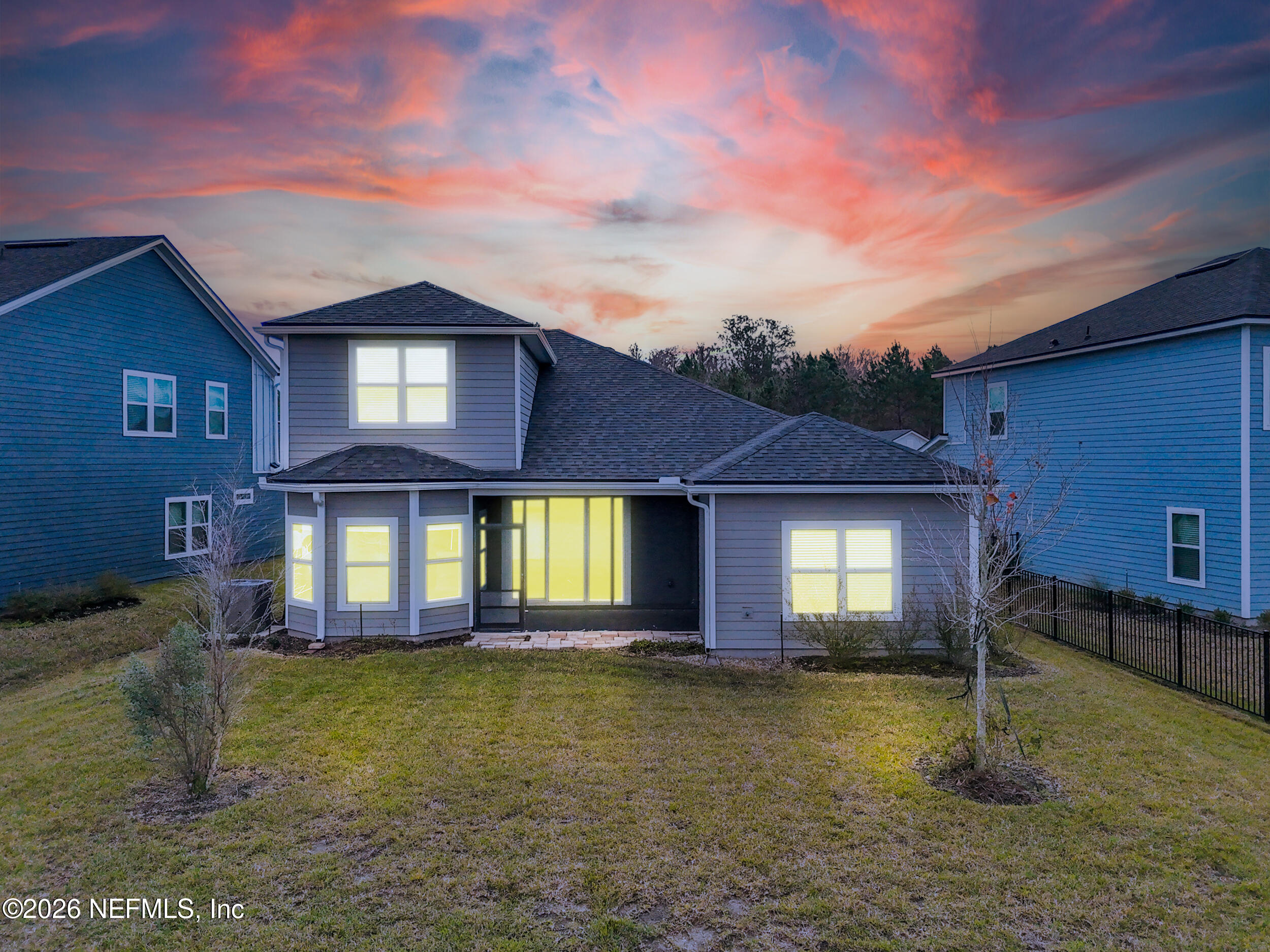 63 Goldcrest Way St. Augustine, FL 32092 - Photo 42 of 56 a front view of a house with a yard