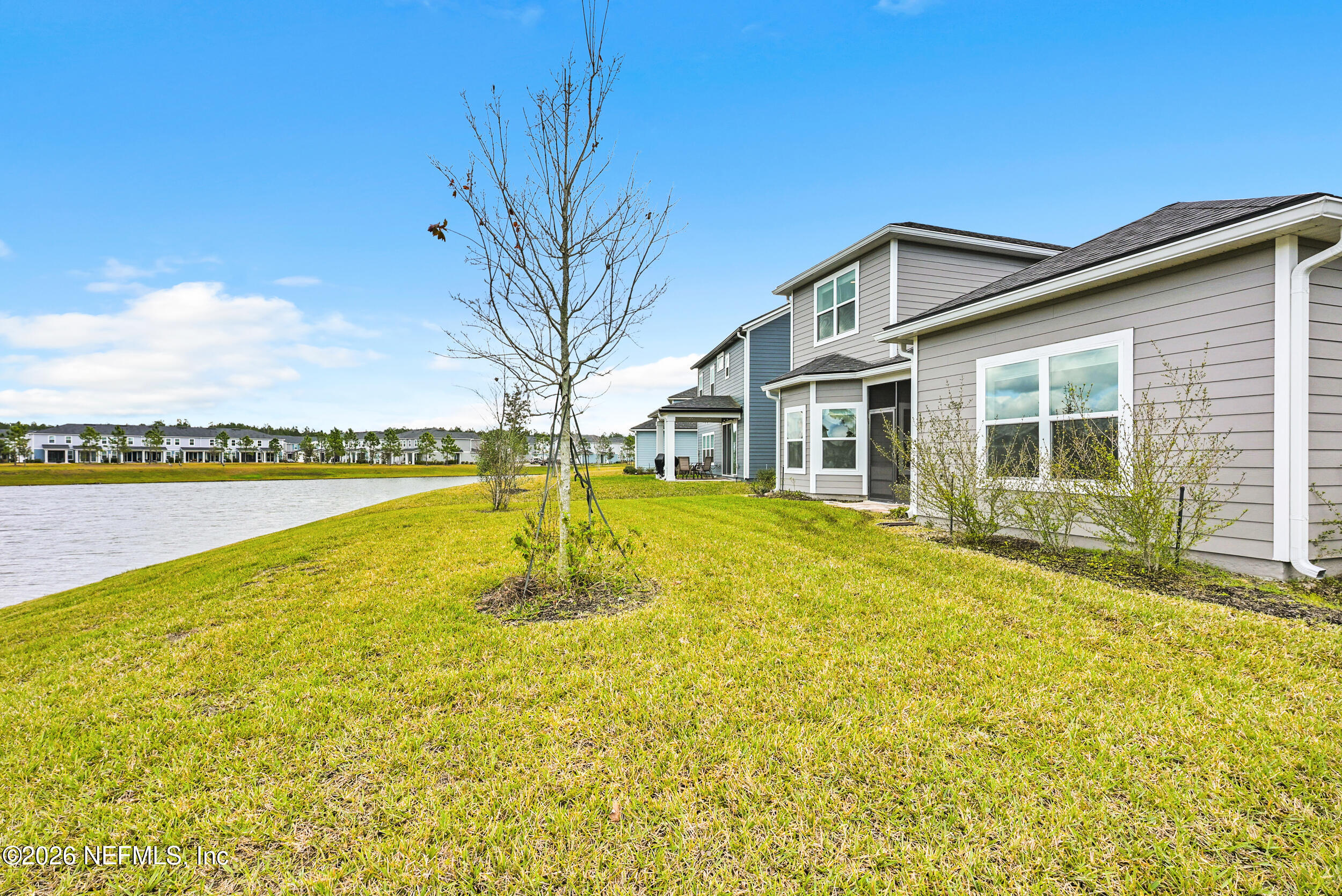 63 Goldcrest Way St. Augustine, FL 32092 - Photo 44 of 56 a view of a house with pool and a yard