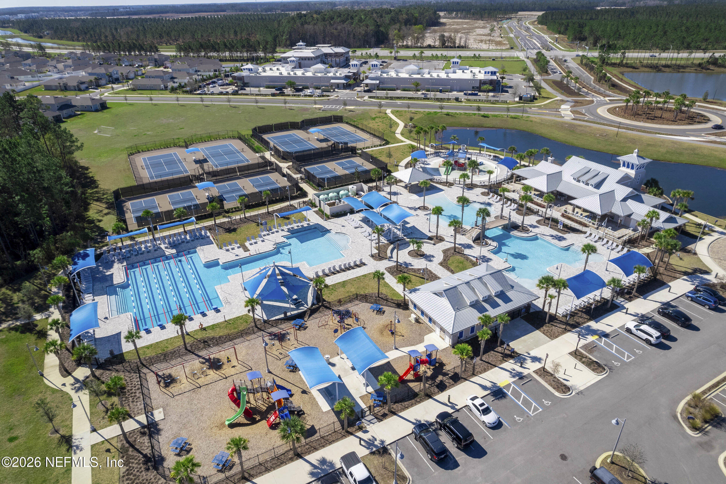 63 Goldcrest Way St. Augustine, FL 32092 - Photo 53 of 56 a view of swimming pool with outdoor seating city view and plants
