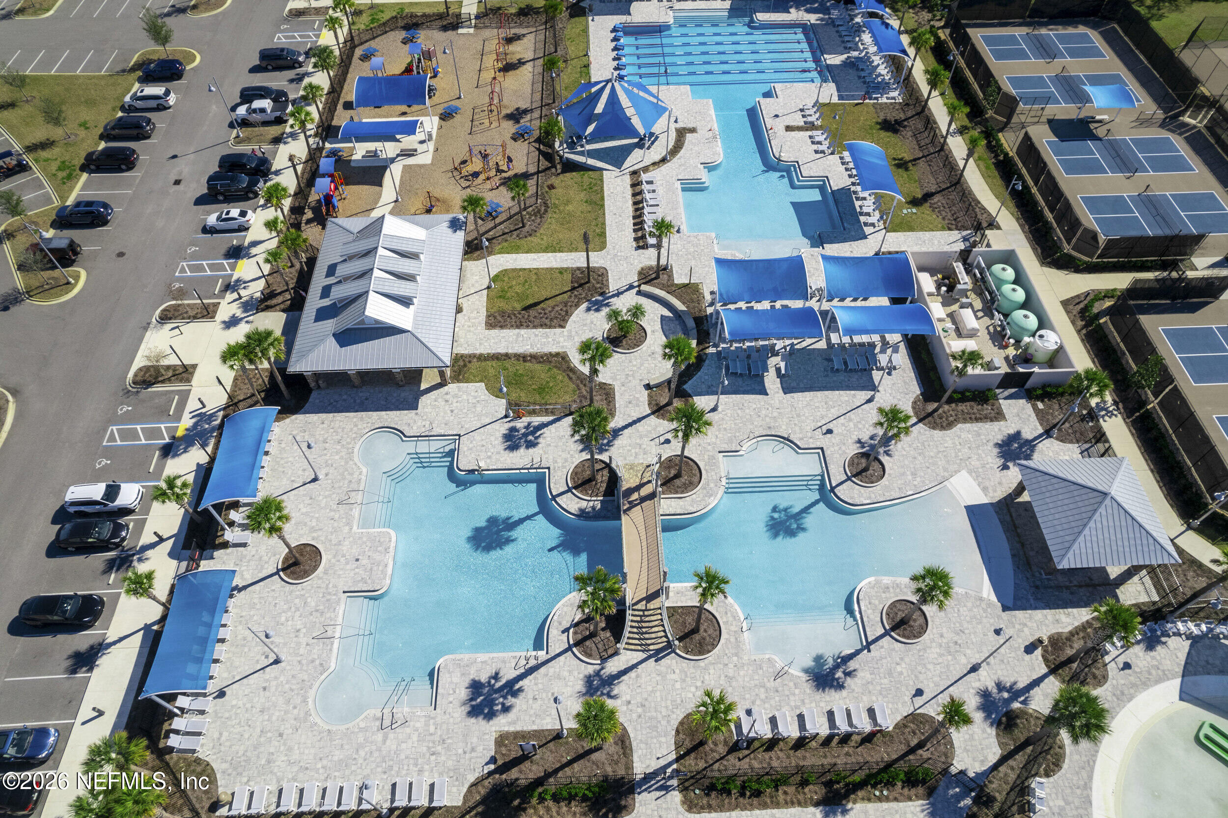63 Goldcrest Way St. Augustine, FL 32092 - Photo 55 of 56 a living room filled with furniture and flowers