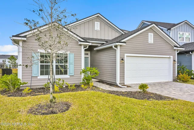 a house view with a garden space