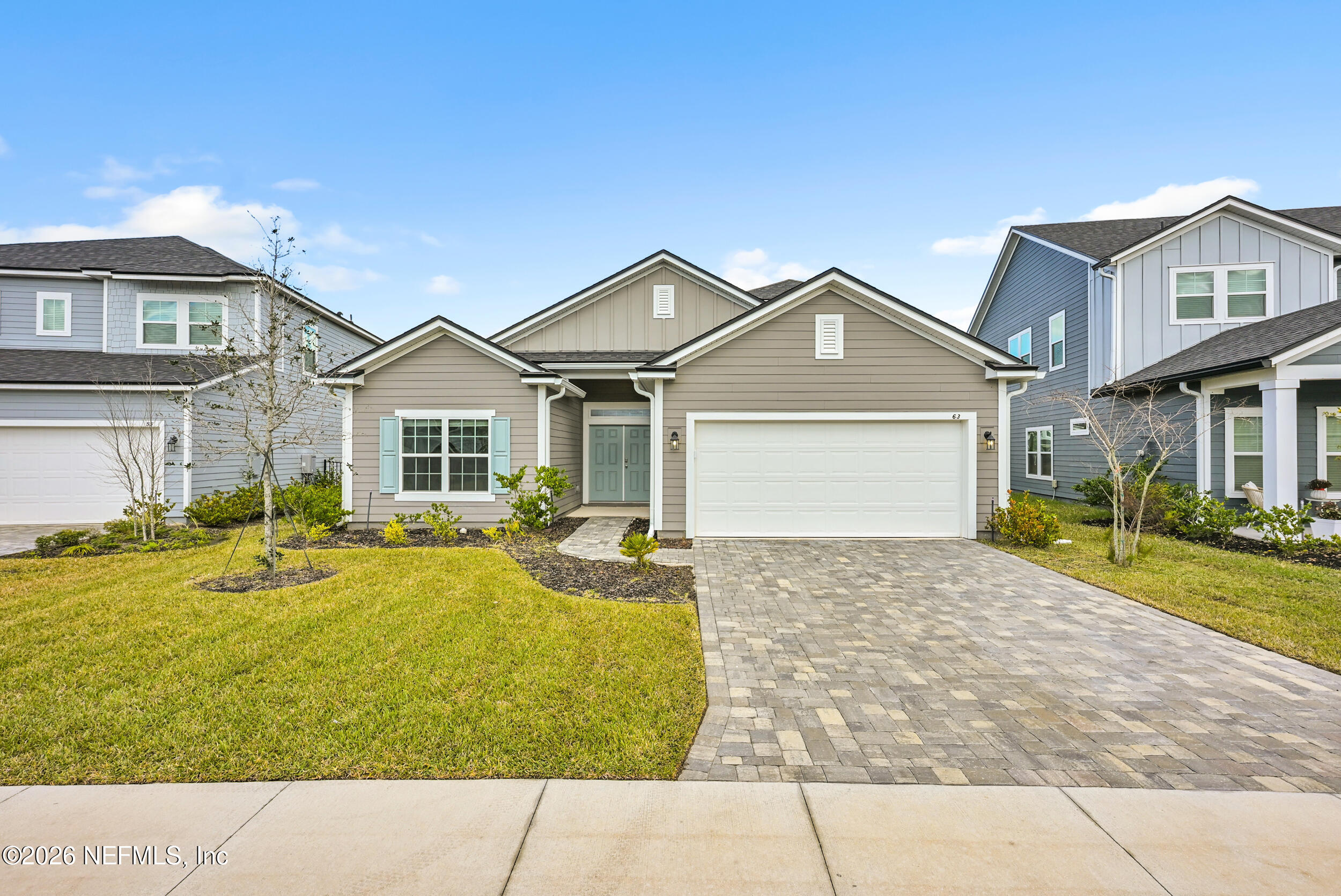 63 Goldcrest Way St. Augustine, FL 32092 - Photo 7 of 56 a house view with a garden space