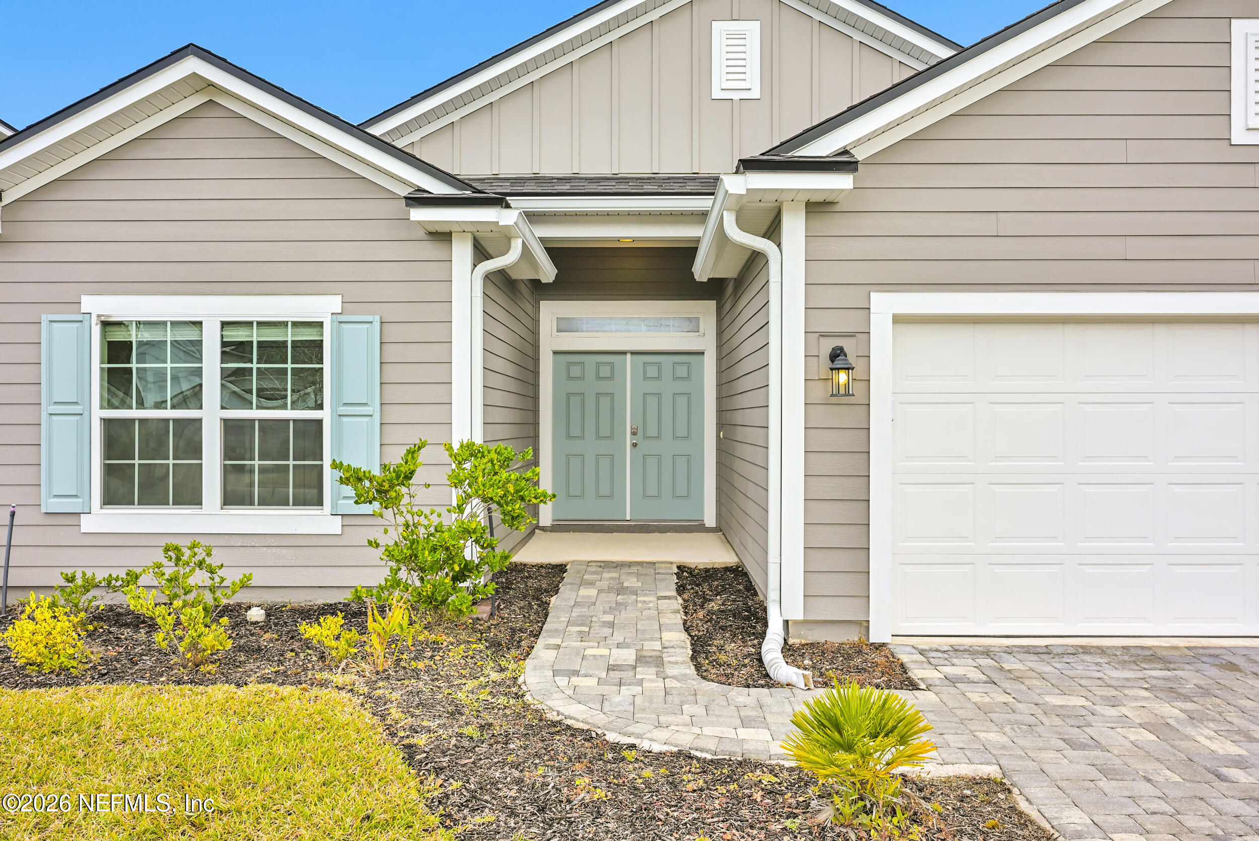 63 Goldcrest Way St. Augustine, FL 32092 - Photo 8 of 56 a front view of a house with a yard