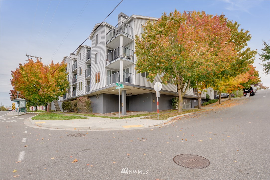 9200 Greenwood Avenue North, Unit 104 Seattle, WA 98103 - Photo 2 of 19 a view of a building with a street