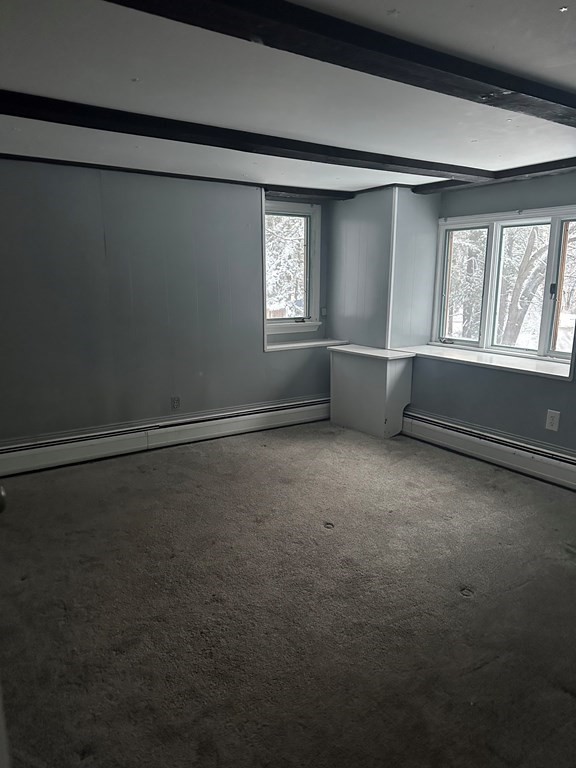 65 Shawsheen Road Billerica, MA 01821 - Photo 8 of 10 a view of an empty room with a window