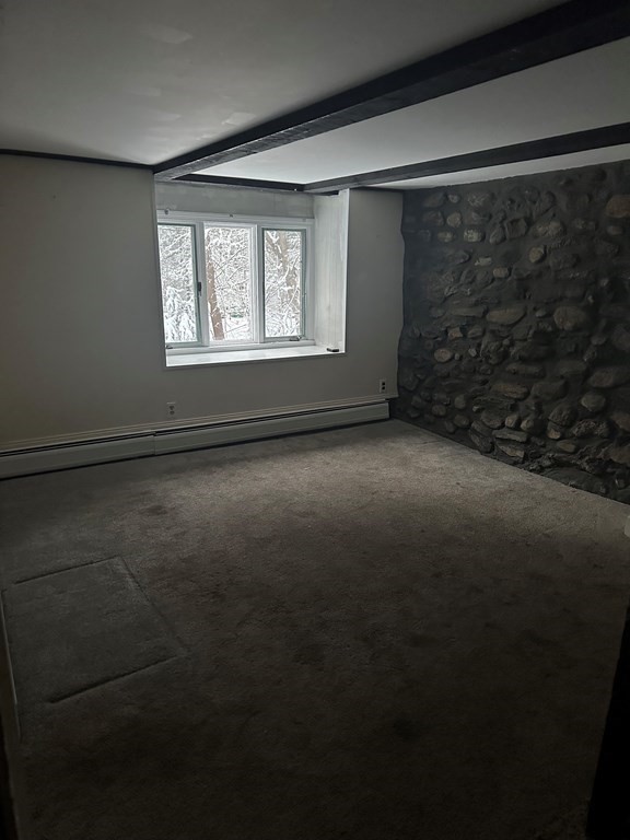 65 Shawsheen Road Billerica, MA 01821 - Photo 9 of 10 a view of an empty room with a window
