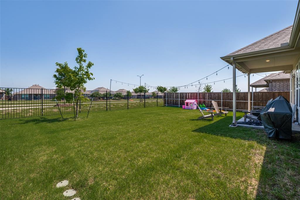 1005 Adelyn Street Anna, TX 75409 - Photo 12 of 12 a view of a park with a large tree