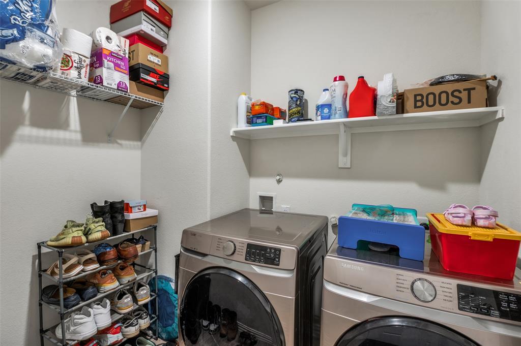 1005 Adelyn Street Anna, TX 75409 - Photo 6 of 12 a utility room with dryer washer and shoe rack