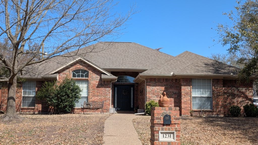 1231 Radisson Drive Hewitt, TX 76643 - Photo 2 of 51 a front view of a house with garden