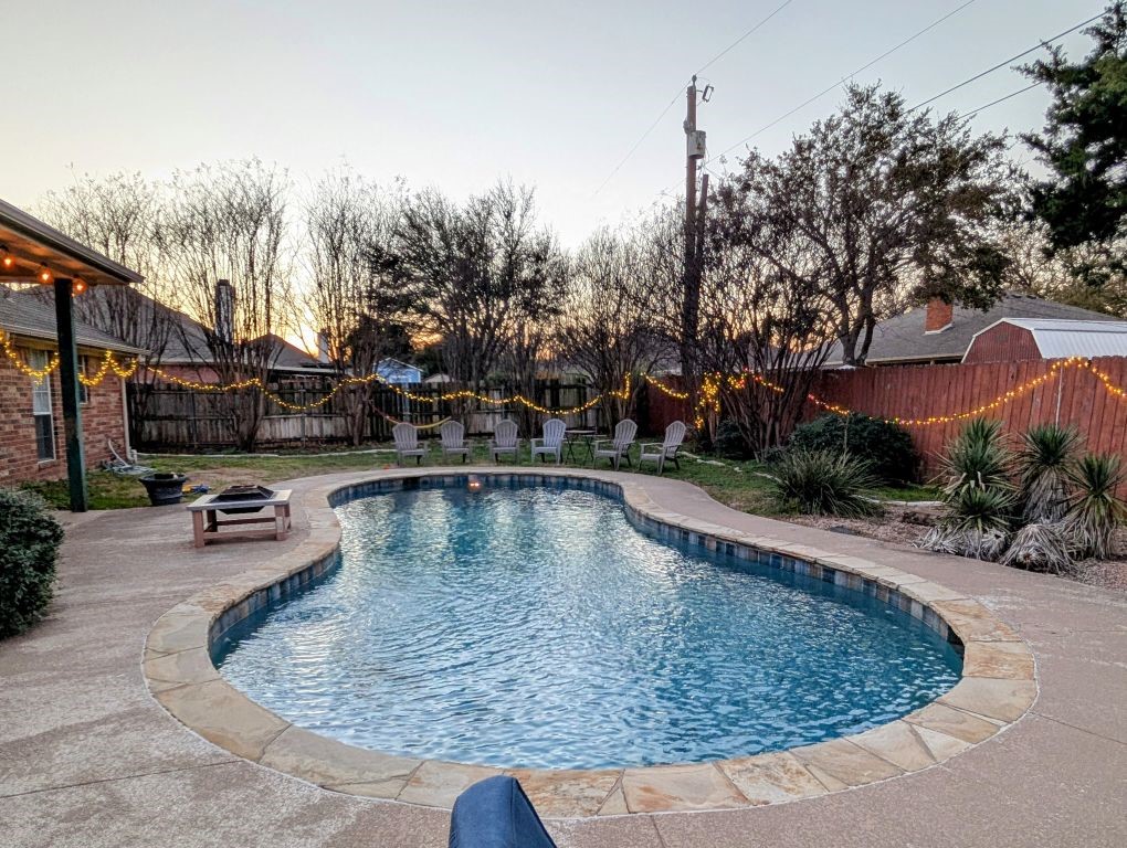 1231 Radisson Drive Hewitt, TX 76643 - Photo 29 of 51 a view of a swimming pool with a yard