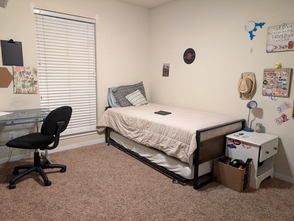 1231 Radisson Drive Hewitt, TX 76643 - Photo 43 of 51 a bedroom with a bed and a chair