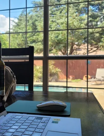a view of a swimming pool with lounge chair