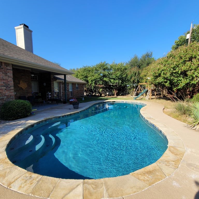 1231 Radisson Drive Hewitt, TX 76643 - Photo 47 of 51 a view of a swimming pool with lounge chair