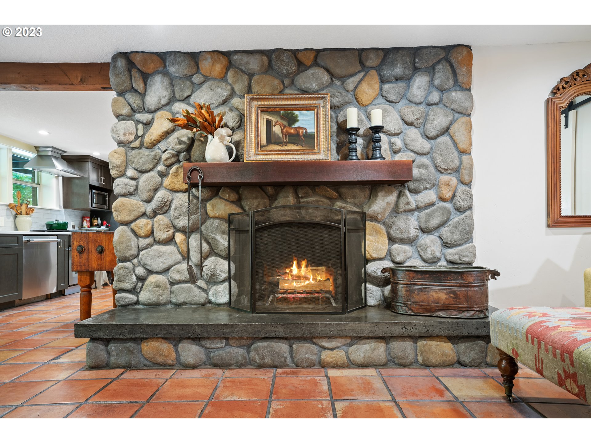 25604 Northeast Manley Road Battle Ground, WA 98604 - Photo 11 of 48 a living room with a fireplace and a rug