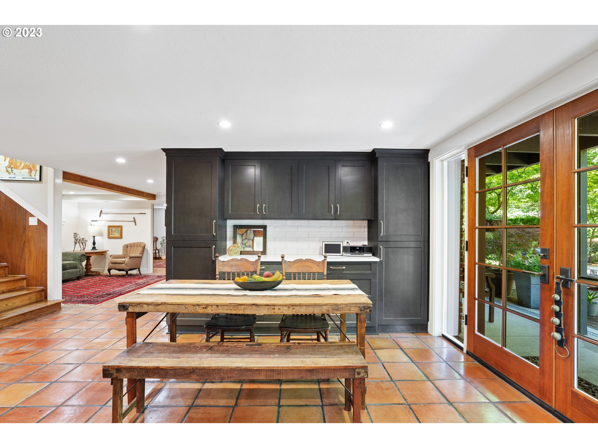 25604 Northeast Manley Road Battle Ground, WA 98604 - Photo 13 of 48 a living room with furniture a table and kitchen view