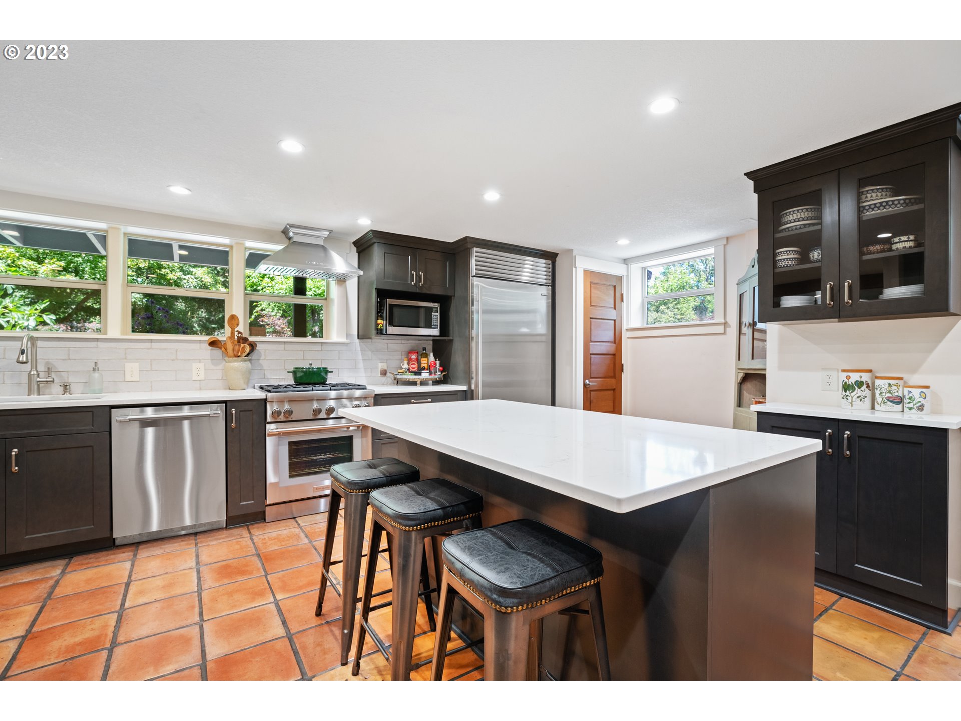 25604 Northeast Manley Road Battle Ground, WA 98604 - Photo 17 of 48 a open kitchen with stainless steel appliances kitchen island granite countertop a sink and cabinets