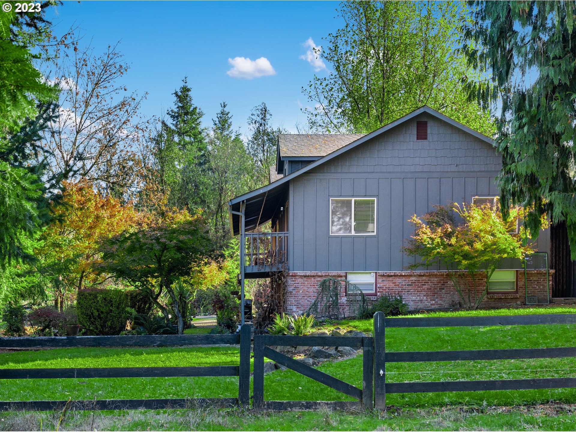 25604 Northeast Manley Road Battle Ground, WA 98604 - Photo 29 of 48 a view of a yard in front of a house with large trees