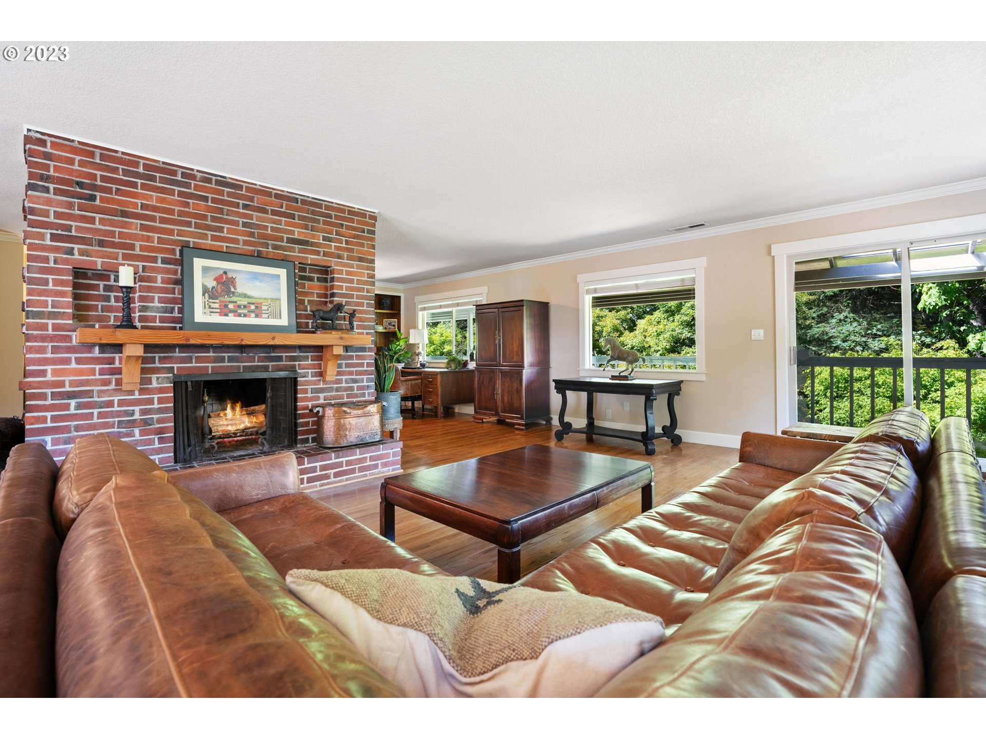 25604 Northeast Manley Road Battle Ground, WA 98604 - Photo 32 of 48 a living room with furniture and a fireplace
