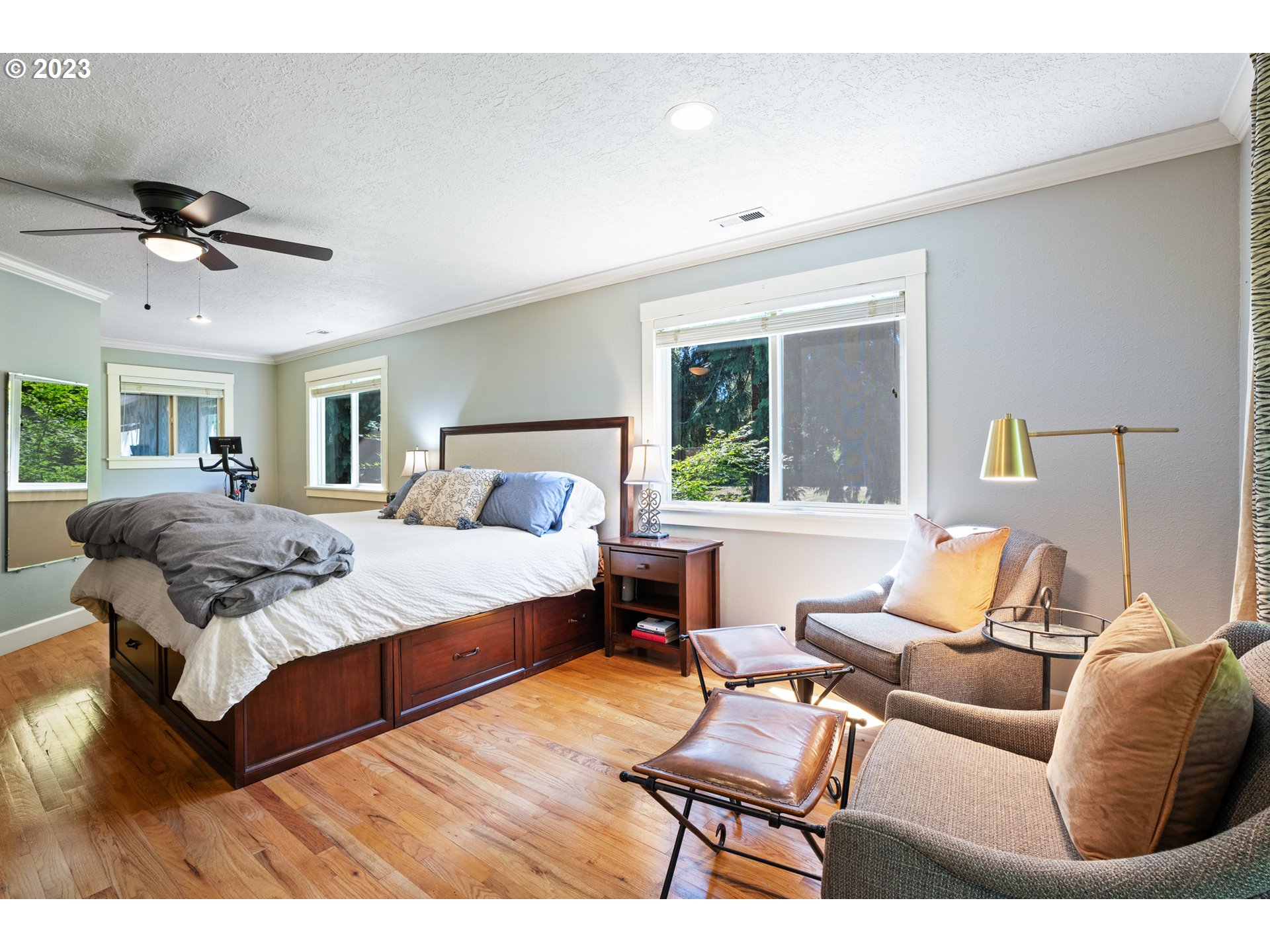 25604 Northeast Manley Road Battle Ground, WA 98604 - Photo 35 of 48 a bedroom with a bed and wooden floor