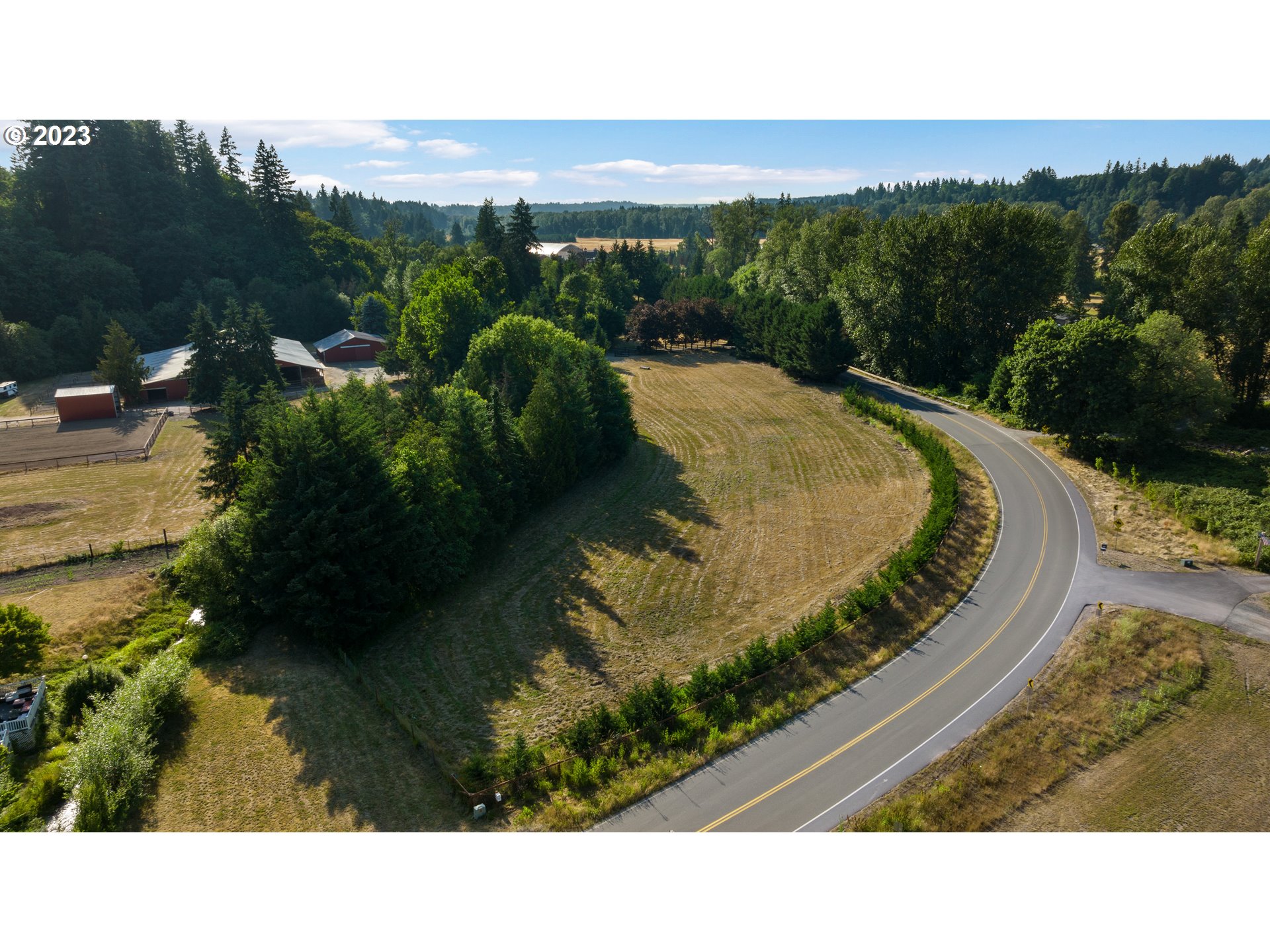 25604 Northeast Manley Road Battle Ground, WA 98604 - Photo 43 of 48 a view of a swimming pool with a yard
