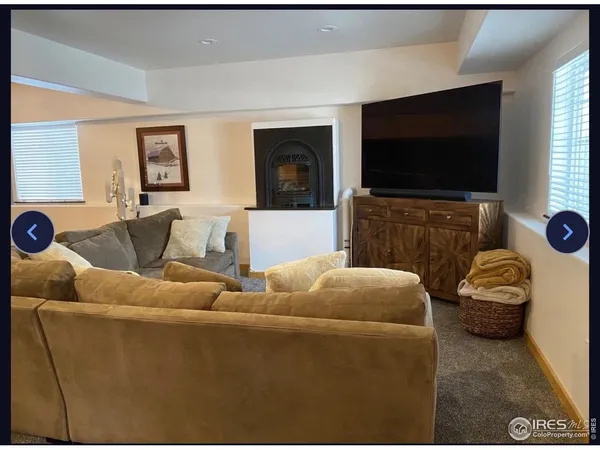 a view of a storage & utility room with two washing machine