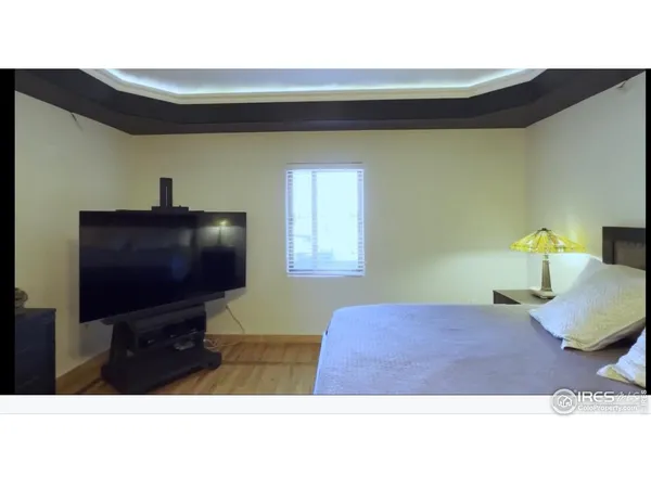 a bathroom with a shower and a sink