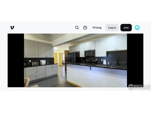 a picture of a living room with furniture