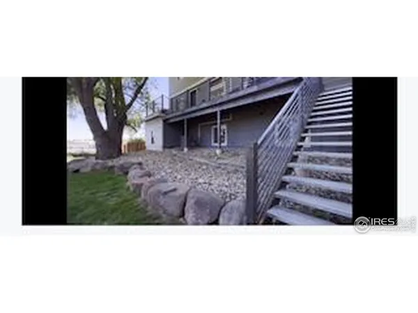 a view of a yard with an outdoor space