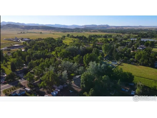 a view of a room with a black and white wall