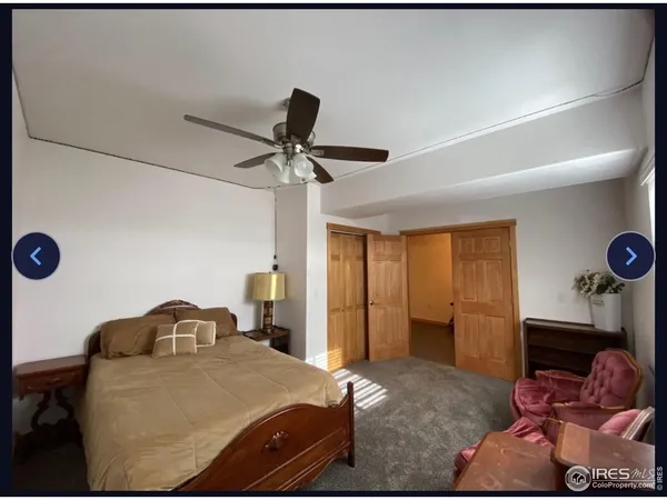 a view of a living room and kitchen view